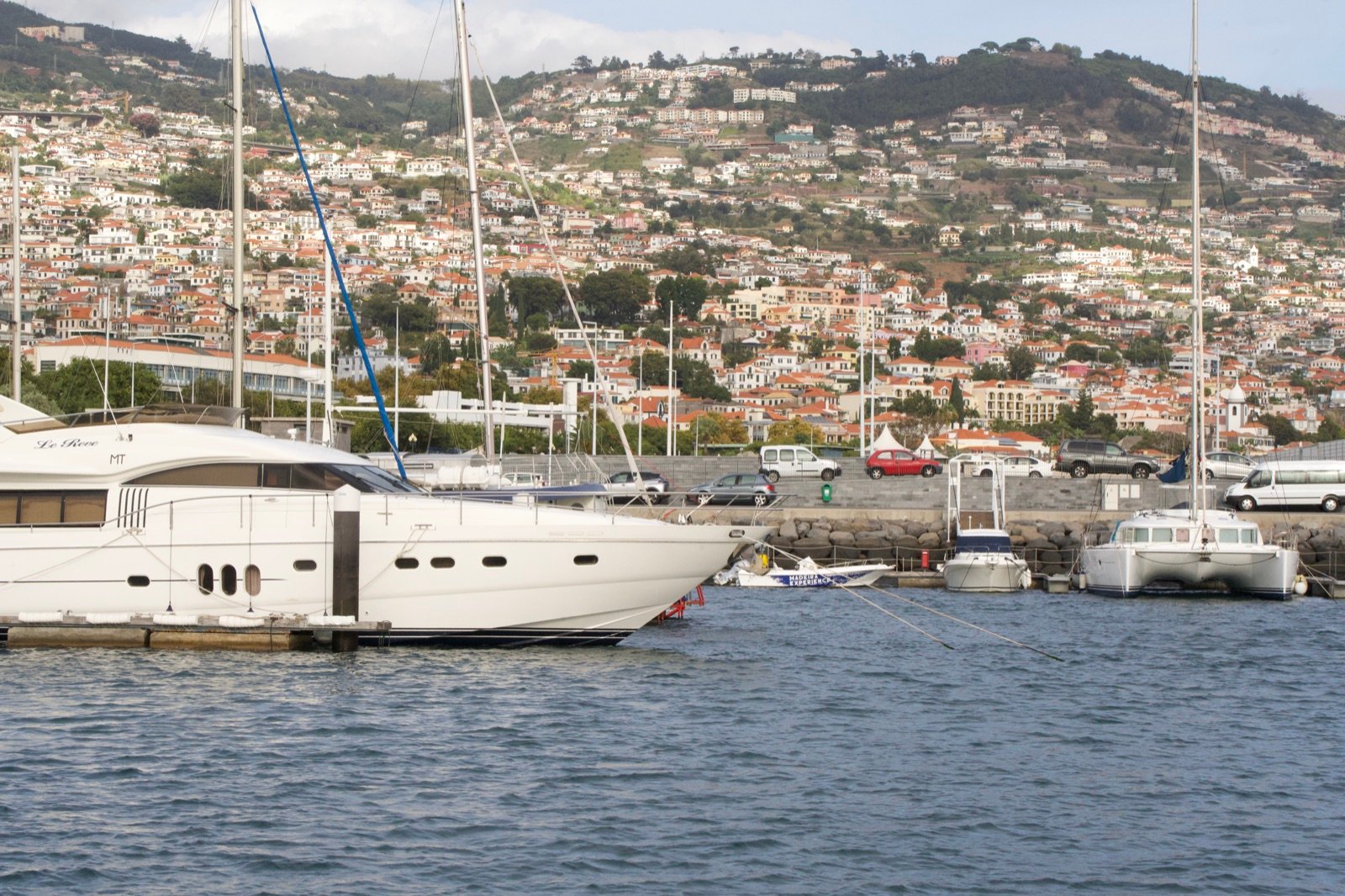 Funchal marina with yachts and the hillside town behind